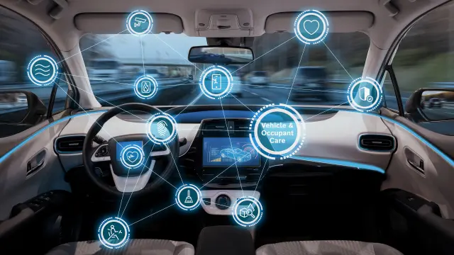 Ansicht eines Fahrzeuginnenraums. In verschiedenen Bubbles sind Icons zu sehen, die den Service symbolisieren. 