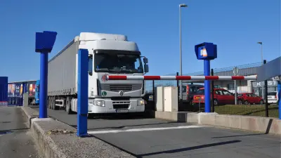 Trucks at the gate of the secure car park in the port of Calais 