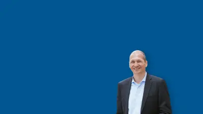 Robert Mulatz looks into the camera, portrait